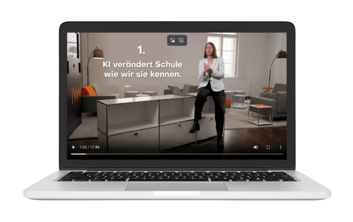 Laptop mit Video zum Thema Künstliche Intelligenz in der Schule; eingeblendeter Text: „KI verändert Schule wie wir sie kennen.“