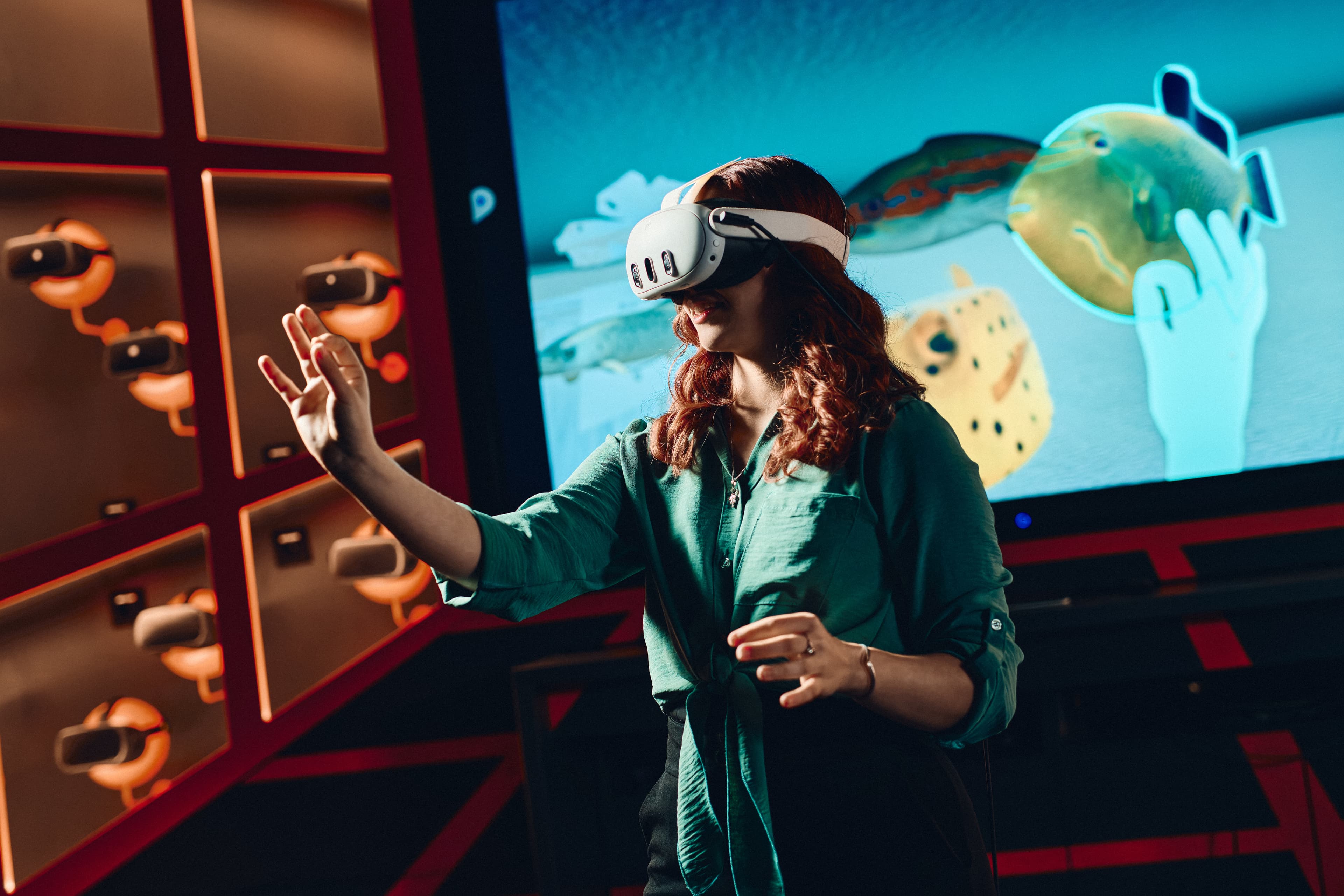 A person with VR glasses using the Mixed Reality Lab