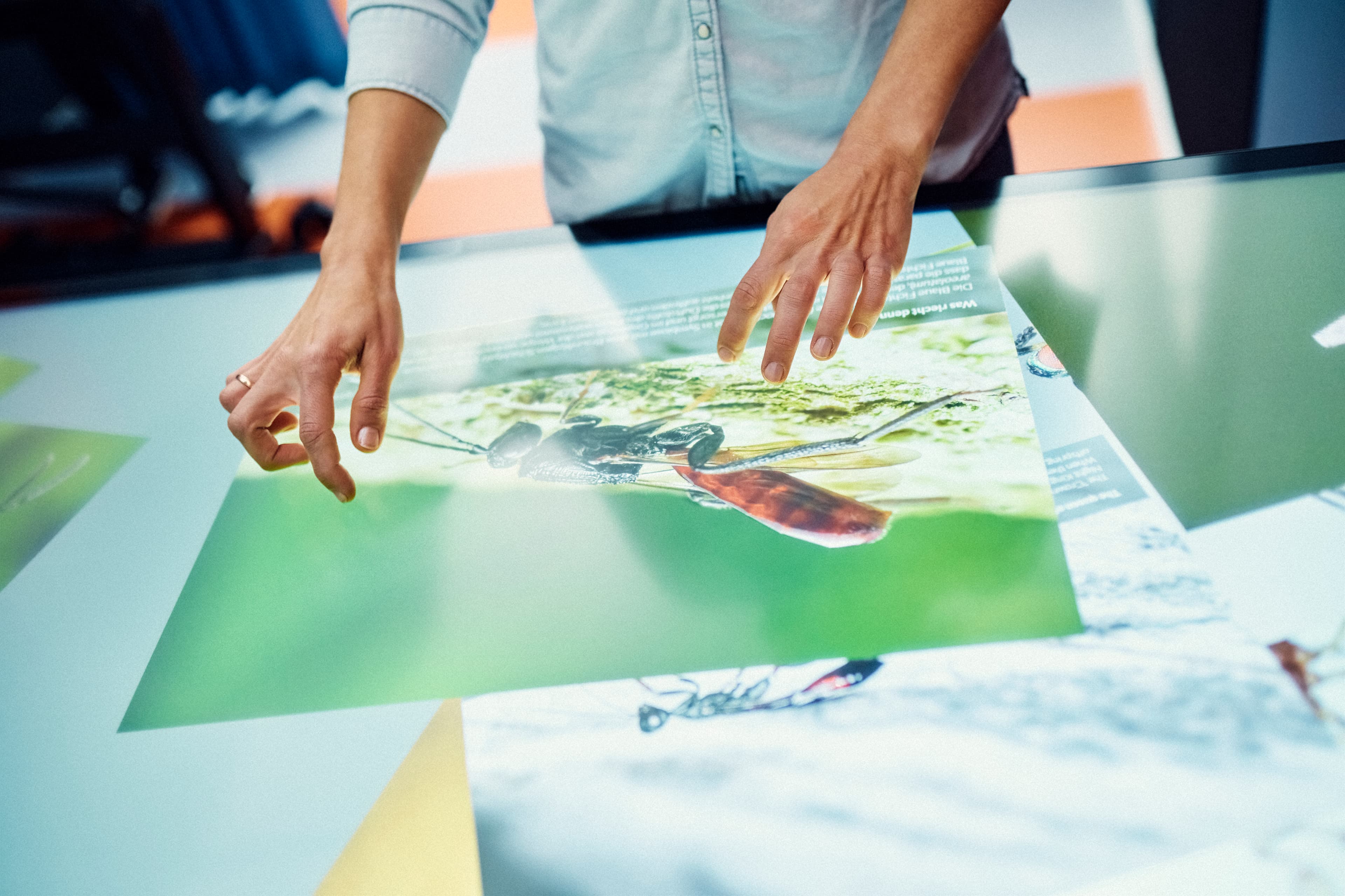 A person using a multi-touch table